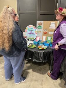 EMG helping visitors at one of the many displays at our 2026 Spring Fling