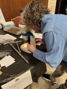 EMG demonstrating how to use a microscope